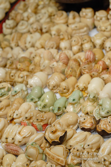 Animals carved from Tagua nuts. Jade Market, Yau Ma Tei, Hong Kong, China.