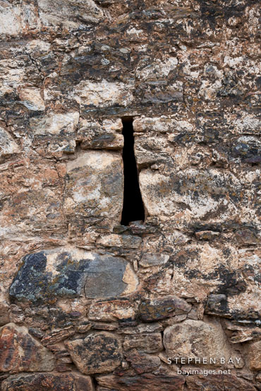 Arrow slit at Drukgyal Dzong. Paro, Bhutan.