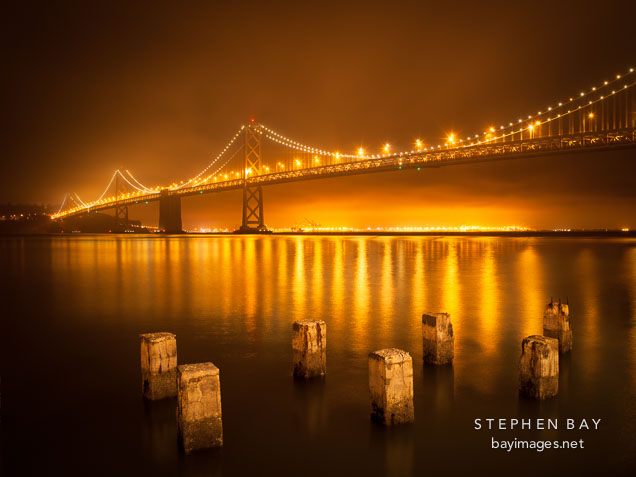 Oakland Bay Bridge and pylons at night.