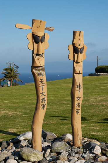 Changseung, Korean totems. Korean Friendship Bell, Angels Gate Park, San Pedro, California, USA.