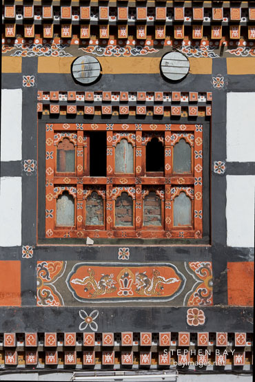 Painted wooden windows in Thimphu, Bhutan.