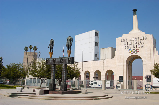 Los Angeles Memorial Coliseum and Olympic Gateway by Robert Graham. Los Angeles, California, USA.