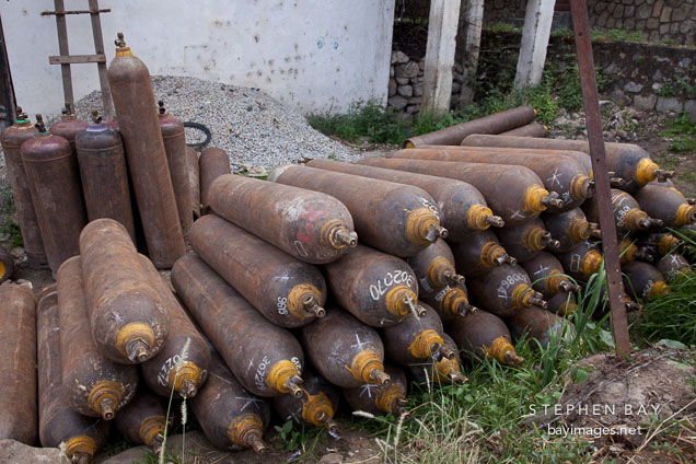 Gas cylinders stacked in a yard. Thimphu, Bhutan.