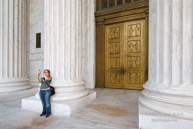 Tourist photographing from the U.S. Supreme Court. Washington, D.C., USA.