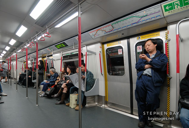 Riding the MTR. Hong Kong, China.