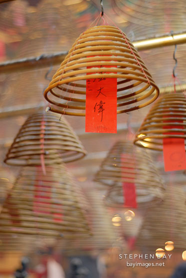 Burning incense coil at Man Mo Temple. Hong Kong, China