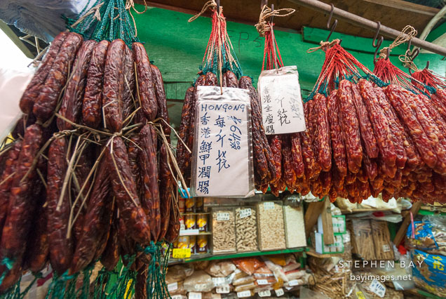 Chinese sausages hanging for sale in market. Central, Hong Kong, China.