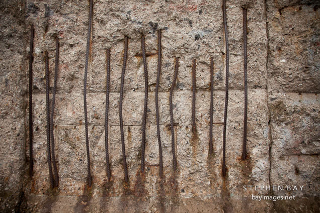 Exposed rebar on the Berlin Wall. Berlin, Germany.