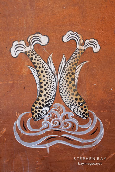 Painting of a pair of spotted fish. Thimphu, Bhutan.