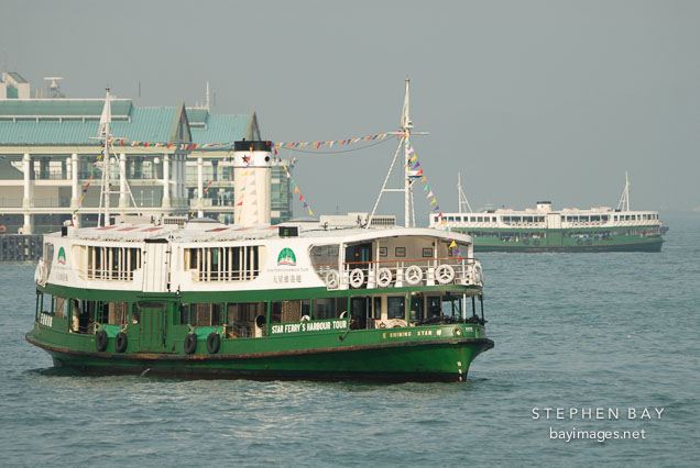Star Ferry in Victoria Harbor goes between Hong Kong Island and Kowloon. Hong Kong, China.
