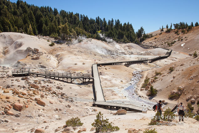 Hikers at Bumpass Hell. Lassen NP, California.