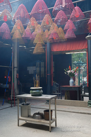 Incense pot and hanging coils. Tin Hau Temple, Hong Kong, China.