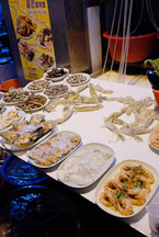 Assortment of seafood, some still live, at a restaurant. Temple Street, Hong Kong, China. - Photo #16217