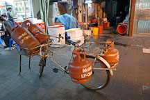 Propane loaded on a bicycle. Temple Street, Hong Kong, China. - Photo #16218