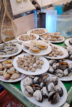 Plates of assorted shellfish. Kowloon, Hong Kong, China. - Photo #16240