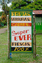 Supermarket sign in Spanish. Fruits, vegetables, and meats. Tortuguero village, Costa Rica. - Photo #14006