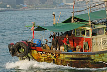 Fishing boat in Victoria Harbor. Hong Kong, China. - Photo #16366