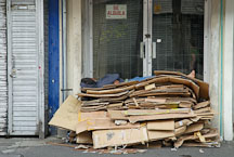 Homeless man sleeping on cardboard bed. San Jose, Costa Rica. - Photo #14376