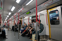 People riding the metro. Hong Kong, China. - Photo #16591