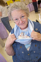 Barbara Henderson shows off two Himalayan rats in her neck pouch. The Wonderful World of Rats, San Mateo, California. - Photo #5994